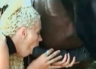 Naughty blonde opens her mouth to get a horse dick deep inside