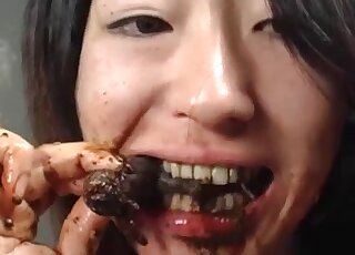 Attractive Japanese babe eats seafood but in a sexualized fashion