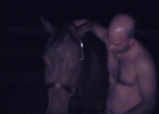 Bald-headed motherfucker wants to fuck a brown mare's huge pussy