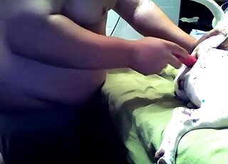 Chubby guy treats dog with anal fingering and ass toying