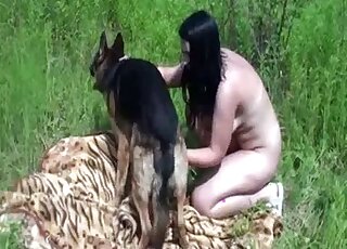 Amateur babe wants to play zoo sex games outdoors with German Shepherd
