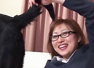 Awesome oral scene showing a bespectacled Asian fucking a dog hard