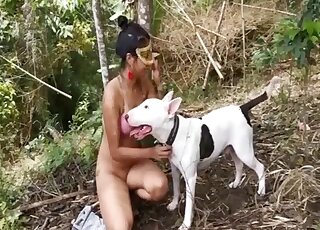Hot Latina filmed with her terrier between the legs licking her cunt