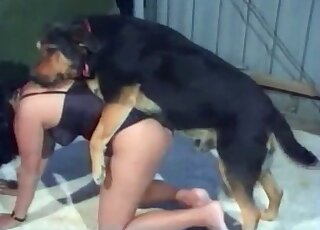 MILF stands on all fours in order to get fucked by her dog from behind